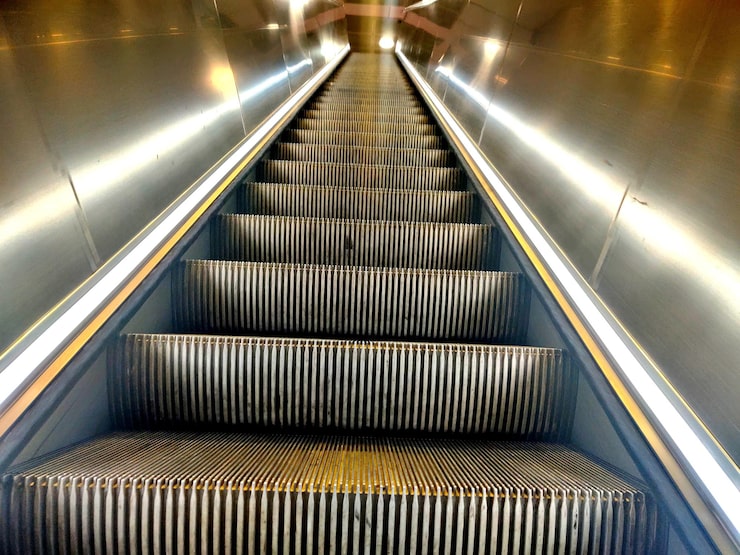 low-angle-view-escalator_1048944-13695604